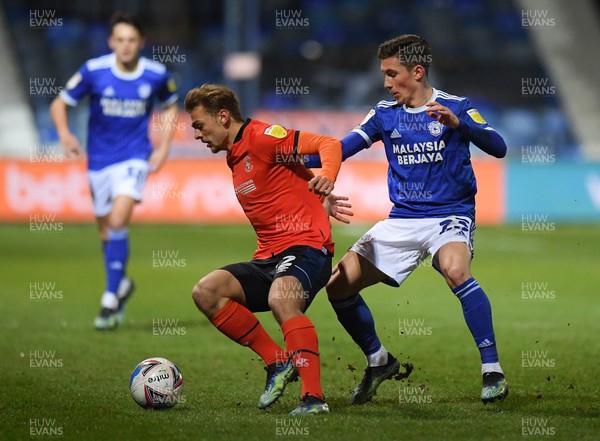 160221 - Luton Town v Cardiff City - Sky Bet Championship - Kiernana Dewsbury-Hall of Luton Town holds off the challenge from Harry Wilson of Cardiff City