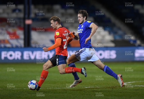 160221 - Luton Town v Cardiff City - Sky Bet Championship - Kiernan Dewsbury-Hall of Luton Town holds off the challenge from Will Vaulks of Cardiff City