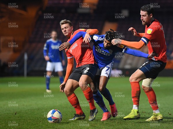 160221 - Luton Town v Cardiff City - Sky Bet Championship - Leandro Bacuna of Cardiff City battles for possession with Kiernan Dewsbury-Hall and Sonny Bradley of Luton Town