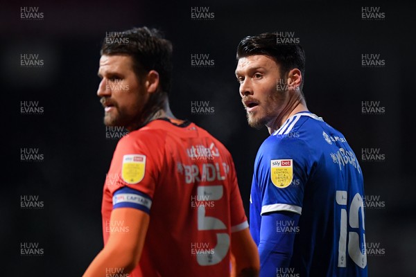 160221 - Luton Town v Cardiff City - Sky Bet Championship - Kieffer Moore of Cardiff City with Sonny Bradley of Luton Town