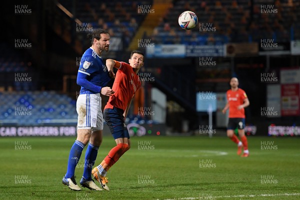 160221 - Luton Town v Cardiff City - Sky Bet Championship - Sean Morrison of Cardiff City battles with Dan Potts of Luton Town
