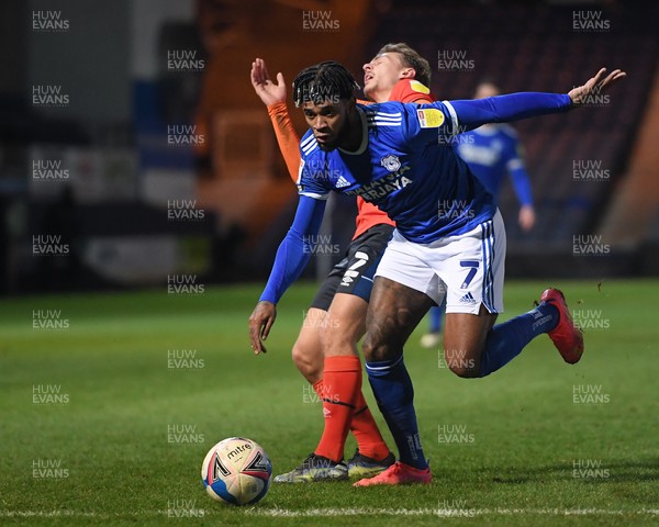 160221 - Luton Town v Cardiff City - Sky Bet Championship - Leandro Bacuna of Cardiff City holds off the challenge from Kiernan Dewsbury-Hall of Luton Town