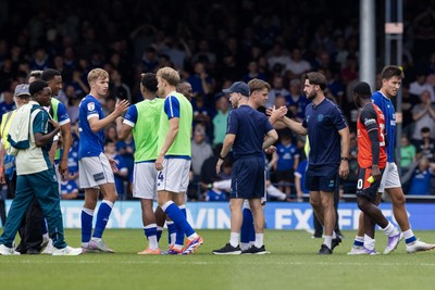 230825 - Luton Town v Cardiff City - Sky Bet League 1 - Cardiff City players celebrate after their victory against Luton Town