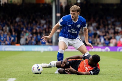 230825 - Luton Town v Cardiff City - Sky Bet League 1 - Cardiff City’s Calum Chambers and Luton Town’s Shandon Baptiste 