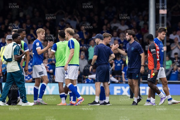230825 - Luton Town v Cardiff City - Sky Bet League 1 - Cardiff City players celebrate after their victory against Luton Town
