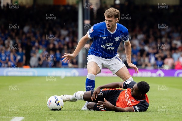 230825 - Luton Town v Cardiff City - Sky Bet League 1 - Cardiff City’s Calum Chambers and Luton Town’s Shandon Baptiste 