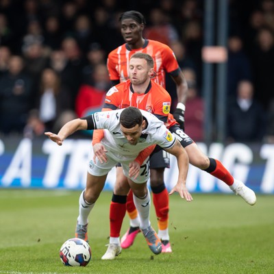 040323 - Luton Town v Swansea City - Sky Bet Championship - Joel Latibeaudiere of Swansea City controls the ball