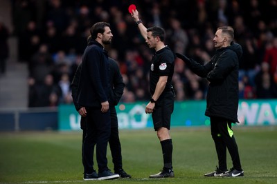 040323 - Luton Town v Swansea City - Sky Bet Championship - Referee Dean Whitestone shows his red card to Russell Martin of Swansea City