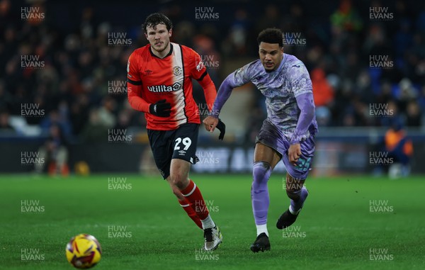 071224 Luton Town v Swansea City, EFL Sky Bet Championship - Myles Peart-Harris of Swansea City gets away from Tom Holmes of Luton Town