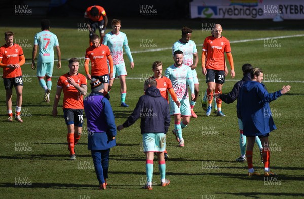 130321 - Luton Town v Swansea City - Sky Bet Championship - Players leave the pitch after Swansea City's 1-0 victory