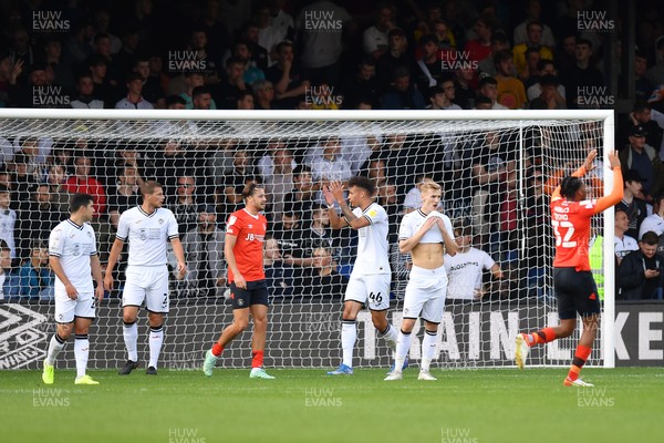 180921 - Luton Town v Swansea City - Sky Bet Championship - Flynn Downes of Swansea City and Rhys Williams dejected as Luton Town score their third goal 