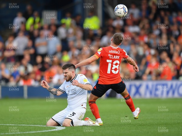 180921 - Luton Town v Swansea City - Sky Bet Championship - Jordan Clark of Luton Town battles for possession with Ryan Manning of Swansea City