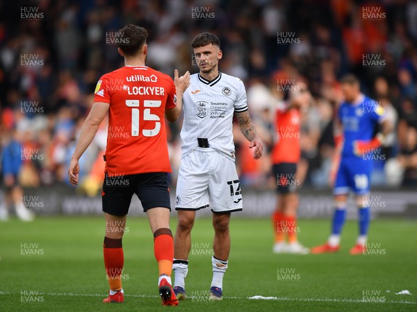 180921 - Luton Town v Swansea City - Sky Bet Championship - Jamie Paterson of Swansea City with Tom Lockyer of Luton Town at the final whistle