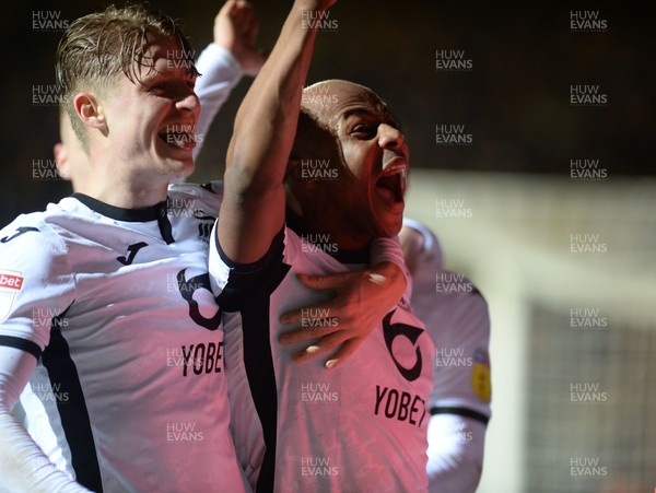 211219 - Luton Town V Swansea City - Sky Bet Championship -  Andre Ayew celebrates scoring the winning goal for Swansea