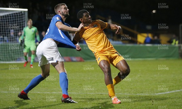 170919 - Macclesfield Town v Newport County - League 2 -   Tristan Abrahams of Newport County tugs on the shirt of Fiacre Kelleher of Macclesfield Town 