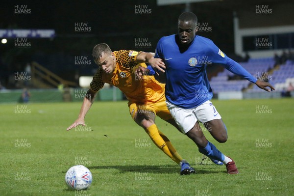 170919 - Macclesfield Town v Newport County - League 2 - Arthur Gnahoua of Macclesfield Town and Kyle Howkins of Newport County 
