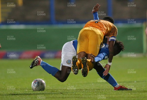 170919 - Macclesfield Town v Newport County - League 2 - Virgil Gomis of Macclesfield Town carries Joss Labadie of Newport County as they tussle for the ball 