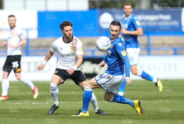 220419 - Macclesfield Town v Newport County, Sky Bet League 2 - Robbie Willmott of Newport County plays the ball past Michael Rose of Macclesfield Town