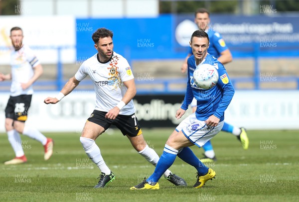 220419 - Macclesfield Town v Newport County, Sky Bet League 2 - Robbie Willmott of Newport County plays the ball past Michael Rose of Macclesfield Town