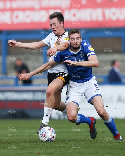 220419 - Macclesfield Town v Newport County, Sky Bet League 2 - Harry McKirdy of Newport County is brought down by Fiacre Kelleher of Macclesfield Town