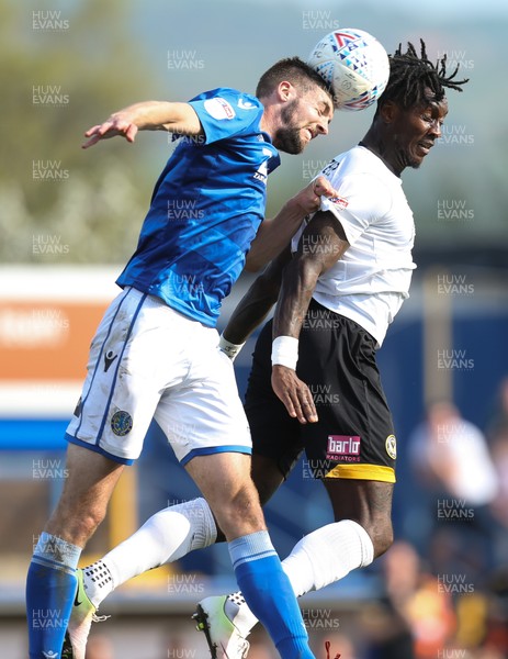 220419 - Macclesfield Town v Newport County, Sky Bet League 2 - Adebayo Azeez of Newport County and Fiacre Kelleher of Macclesfield Town compete for the ball