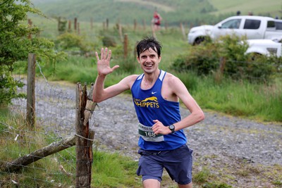 110622 - Whole Earth Man v Horse Race - Competitors take part in the Whole Earth Man v Horse race in Llanwrtyd Wells, Wales Running for over 40 years, Man v Horse is an epic 225-mile challenge which pits humans against horses across a multi-terrain course It is being staged for the first time after a two year absence due to the Covid Pandemic