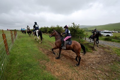 110622 - Whole Earth Man v Horse Race - Competitors take part in the Whole Earth Man v Horse race in Llanwrtyd Wells, Wales Running for over 40 years, Man v Horse is an epic 225-mile challenge which pits humans against horses across a multi-terrain course It is being staged for the first time after a two year absence due to the Covid Pandemic