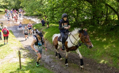 130626 - Man v Horse, Llanwrytd Wells - Competitors make their way around the course during the annual Man v Horse Race held at Llanwrytd Well, Powys, Wales
