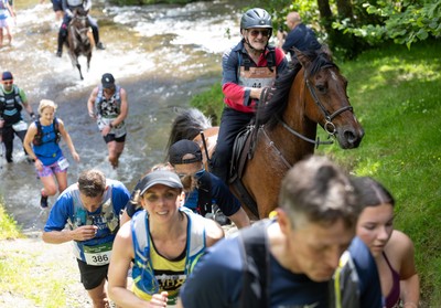 130626 - Man v Horse, Llanwrytd Wells - Competitors make their way around the course during the annual Man v Horse Race held at Llanwrytd Well, Powys, Wales