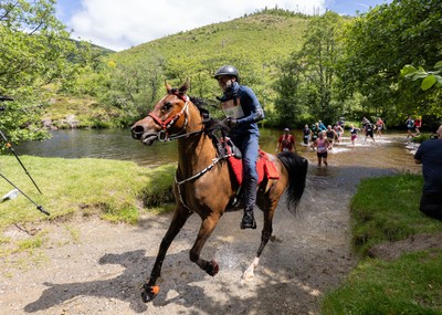 130626 - Man v Horse, Llanwrytd Wells - Competitors make their way around the course during the annual Man v Horse Race held at Llanwrytd Well, Powys, Wales