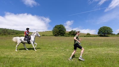 130626 - Man v Horse, Llanwrytd Wells - Competitors make their way around the course during the annual Man v Horse Race held at Llanwrytd Well, Powys, Wales