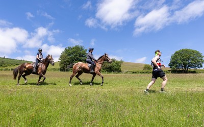 130626 - Man v Horse, Llanwrytd Wells - Competitors make their way around the course during the annual Man v Horse Race held at Llanwrytd Well, Powys, Wales