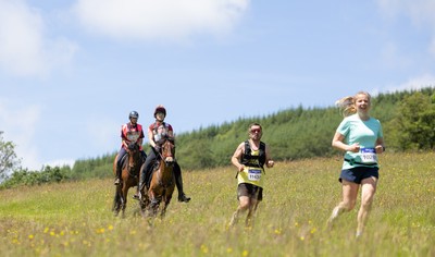 130626 - Man v Horse, Llanwrytd Wells - Competitors make their way around the course during the annual Man v Horse Race held at Llanwrytd Well, Powys, Wales
