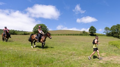 130626 - Man v Horse, Llanwrytd Wells - Competitors make their way around the course during the annual Man v Horse Race held at Llanwrytd Well, Powys, Wales