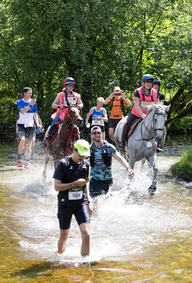 130626 - Man v Horse, Llanwrytd Wells - Competitors make their way around the course during the annual Man v Horse Race held at Llanwrytd Well, Powys, Wales