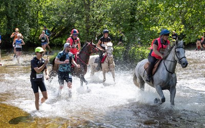 130626 - Man v Horse, Llanwrytd Wells - Competitors make their way around the course during the annual Man v Horse Race held at Llanwrytd Well, Powys, Wales