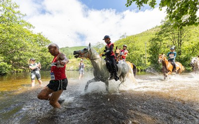 130626 - Man v Horse, Llanwrytd Wells - Competitors make their way around the course during the annual Man v Horse Race held at Llanwrytd Well, Powys, Wales