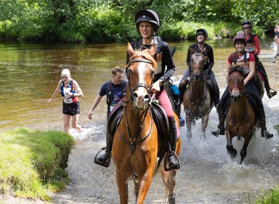 130626 - Man v Horse, Llanwrytd Wells - Competitors make their way around the course during the annual Man v Horse Race held at Llanwrytd Well, Powys, Wales
