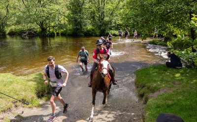 130626 - Man v Horse, Llanwrytd Wells - Competitors make their way around the course during the annual Man v Horse Race held at Llanwrytd Well, Powys, Wales