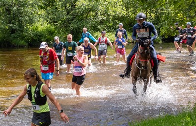 130626 - Man v Horse, Llanwrytd Wells - Competitors make their way around the course during the annual Man v Horse Race held at Llanwrytd Well, Powys, Wales