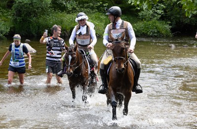 130626 - Man v Horse, Llanwrytd Wells - Newly married Nigel and Saffron Griffin, who married before the start of the race at the annual Man v Horse Race held at Llanwrytd Well, Powys, Wales