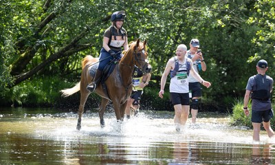 130626 - Man v Horse, Llanwrytd Wells - Competitors make their way around the course during the annual Man v Horse Race held at Llanwrytd Well, Powys, Wales