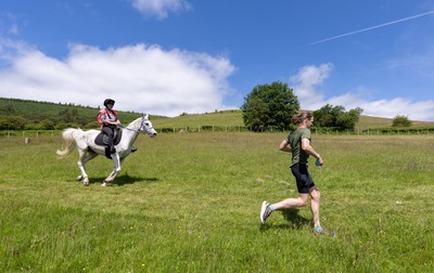 130626 - Man v Horse, Llanwrytd Wells - Competitors make their way around the course during the annual Man v Horse Race held at Llanwrytd Well, Powys, Wales
