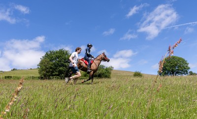 130626 - Man v Horse, Llanwrytd Wells - Competitors make their way around the course during the annual Man v Horse Race held at Llanwrytd Well, Powys, Wales