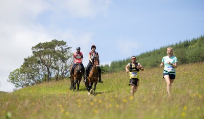 130626 - Man v Horse, Llanwrytd Wells - Competitors make their way around the course during the annual Man v Horse Race held at Llanwrytd Well, Powys, Wales