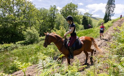 130626 - Man v Horse, Llanwrytd Wells - Competitors make their way around the course during the annual Man v Horse Race held at Llanwrytd Well, Powys, Wales