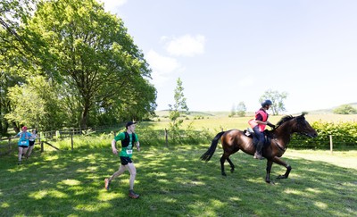 130626 - Man v Horse, Llanwrytd Wells - Competitors make their way around the course during the annual Man v Horse Race held at Llanwrytd Well, Powys, Wales