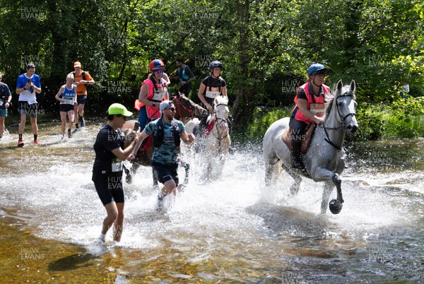 130626 - Man v Horse, Llanwrytd Wells - Competitors make their way around the course during the annual Man v Horse Race held at Llanwrytd Well, Powys, Wales