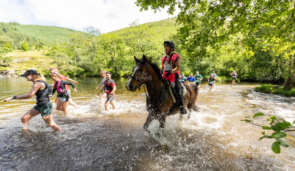 130626 - Man v Horse, Llanwrytd Wells - Competitors make their way around the course during the annual Man v Horse Race held at Llanwrytd Well, Powys, Wales