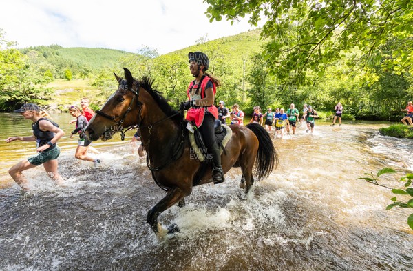 130626 - Man v Horse, Llanwrytd Wells - Competitors make their way around the course during the annual Man v Horse Race held at Llanwrytd Well, Powys, Wales